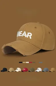 Detailed view of NEAR embroidery and distressed brim on cotton baseball cap