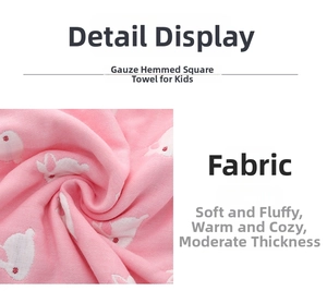 Close-up of pink 6-layer cotton gauze towel with white rabbit print and soft texture