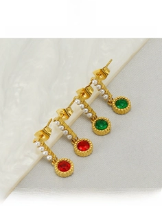 Close-up of vintage emerald and ruby pearl earrings in 18K gold plated titanium steel