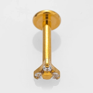 Gold stainless steel cross lip stud with clear cubic zirconia on white background