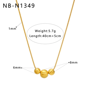 Detail of 18K gold plated irregular chunky pendant necklace with 1mm snake chain