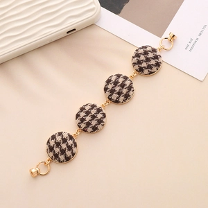 Golden chain accessory with houndstooth patterns for phone cases and DIY bags