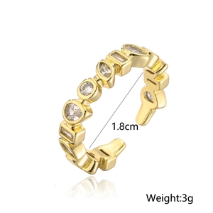 Detail showing irregular gold ring dimensions 1.8cm diameter and 3g weight with zircon