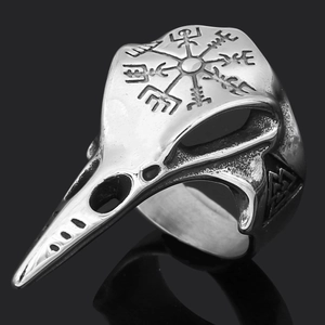 Detail of Viking bird skull ring featuring Vegvisir compass and Valknut runes