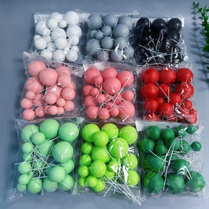 Detailed view of cake topper sets in nine different colors and various ball sizes