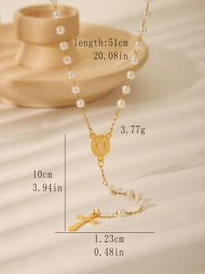 Detail of gold rosary necklace with faux pearls showing cross pendant and size dimensions