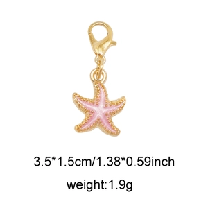 Pink starfish enamel charm with lobster clasp and gold border for bags and shoes