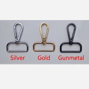 Three swivel snap hooks in silver, gold, and gunmetal finishes for bag straps