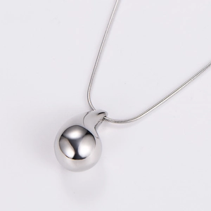 Polished silver stainless steel teardrop pendant necklace with delicate snake chain