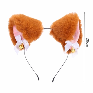 Cute plush cat ear headband with orange faux fur, white bows, and golden bells