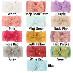 Set of 13 colorful baby nylon headbands with gold polka dot bows for newborns