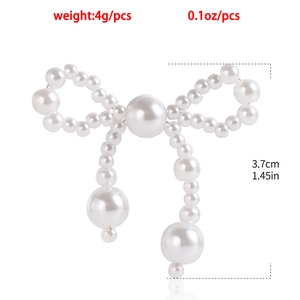 Detailed size view of pearl bow earrings measuring 3.7cm height and 4g weight
