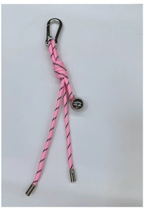 Close-up of pink paracord braided keychain with silver metal ball and carabiner