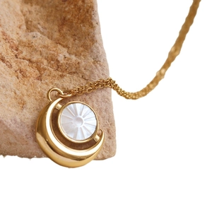 Minimalist sun and moon pendant necklace with shell inlay on golden stainless steel chain