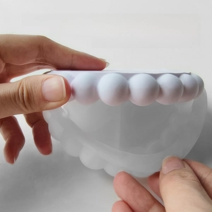 Detail of flexible silicone mold showing 3:1 plaster mixing ratio and 1-2h demolding time