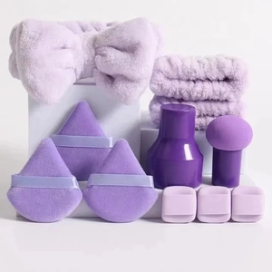 11-piece purple flannel beauty set with bow headband, wristbands and makeup sponges