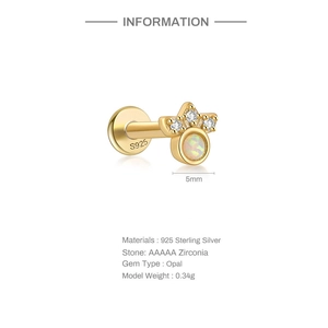 Macro detail of S925 sterling silver opal stud earring with gold plating and zirconia