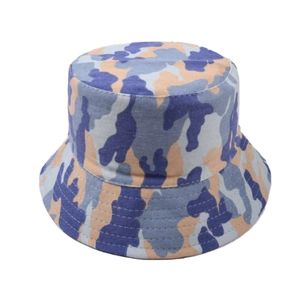 Detailed close-up of camouflage bucket hat showing blue orange patterns and stitching