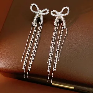 18k gold plated silver needle bow tassel earrings with sparkling zircon crystals