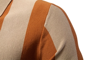 Detailed view of the brown and beige striped knit polo texture on the shoulder and collar