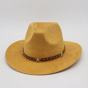 Detail of silver star studs and rivets on a brown leather band of a yellow cowboy hat