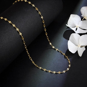 Elegant 18k gold plated titanium steel lip link chain necklace for women on dark background