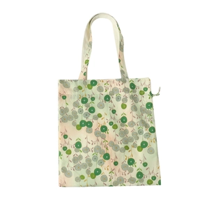 Floral canvas tote bag with green dandelion print for women commute and daily use
