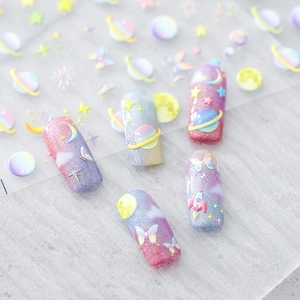 3D embossed nail stickers featuring colorful cosmic planets and glitter butterfly designs