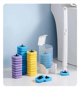 Detail of disposable toilet brush set with white handle and multi-colored sponge refills