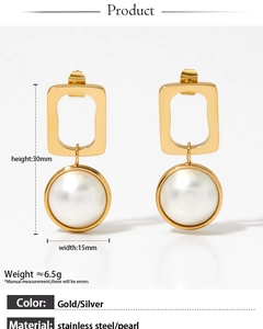 Macro shot of gold geometric earrings with pearl, size 30mm by 15mm, stainless steel detail