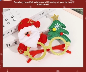 Detailed view of Christmas glasses frame with plush Santa Claus and festive green tree decoration