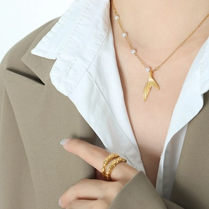 Elegant gold mermaid tail pearl pendant necklace and textured ring set for women