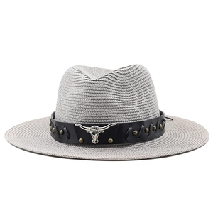 Gray cowboy straw hat with wide brim, leather band and silver bull head ornament