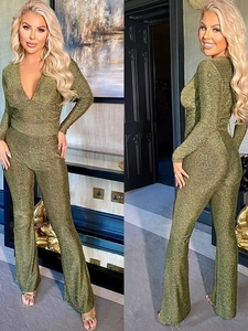 Tuta con paillettes verde-oro con scollo a V profondo e maniche lunghe da donna