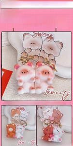 Close-up of three sets of cute resin animal keychains with gold metal rings