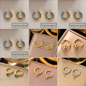 Titanium steel hoop earrings collection with pearls and gold beads in various sizes