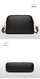 Detail view of black lychee grain shell bag showing back and bottom angles with gold hooks