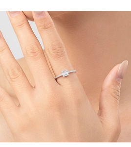 Close-up of S925 sterling silver ring with square-cut center stone and pave diamonds