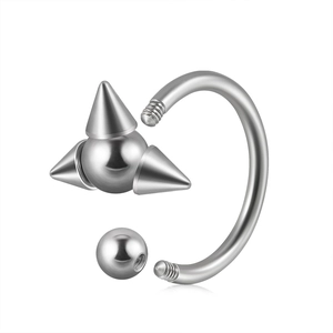 Polished stainless steel horseshoe ring with spike and ball ends for punk piercings