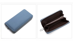 Detailed interior of a blue leather wallet showing card slots and zipper compartment