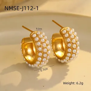 Detailed view of 18K gold-plated C-shape earrings with inlaid white pearls and 0.7cm width