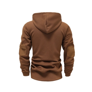 Detailed back view of brown hooded sweatshirt showing waffle knit texture and elbow patches