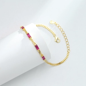 Detail of s925 silver gold chain featuring four rectangular pink zircon stones
