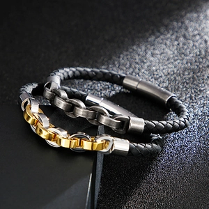 Close-up of leather braided bracelets with gold and silver magnetic metal clasps