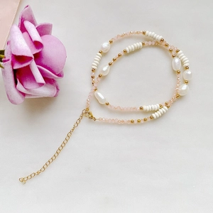 Handmade necklace with natural baroque pearls and pink crystal beads in titanium steel