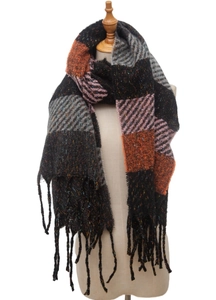 Detail shot of multi-color striped wool scarf with fringe on white background