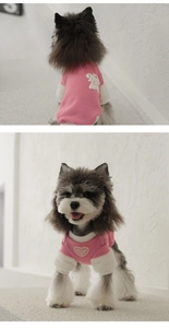 Détail d'un sweat en peluche rose pour chien avec broderie cœur et impression 3D