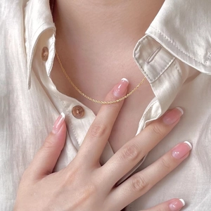 Elegant 925 sterling silver shell pendant necklace in gold on female model neck