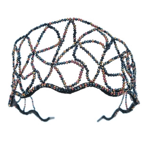 Detailed view of handmade crystal bridal headband with metallic beads and hollow pattern