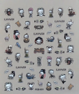 Macro view of Halloween nail stickers with 5D embossed gothic skulls and pumpkin designs
